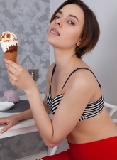 Slim girl loves to eat ice-cream and expose her hairy cunny