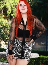 Outdoor solo MILF pictures of chubby redhead with bush