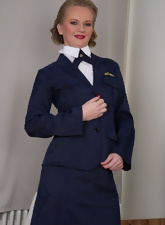 Uniform-wearing flight attendant shows aging pussy in HQ