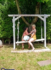 Milf Lesbian Tease On Garden Swing