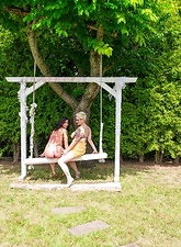 Milf Lesbian Tease On Garden Swing