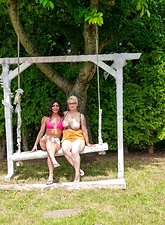 Milf Lesbian Tease On Garden Swing