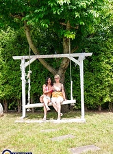 Milf Lesbian Tease On Garden Swing