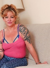 Tattooed Mature Solo Dildo Play Pics