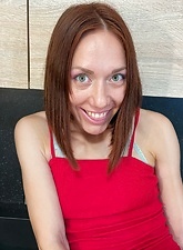 Slender Redhead MILF Kitchen Nude Gallery