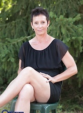 GILF Outdoor Strip And Tease Pictures