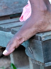 Shy Ebony Babe Exposes Hairy Pussy Gallery