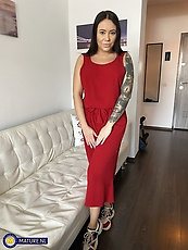 Busty babe teases topless in red dress and black lace thong