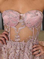 Exotic woman in a lace lingerie shows us her body and ass