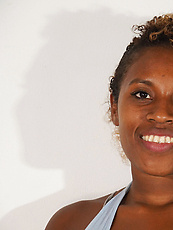 Ebony babe exposes hairy pussy and natural tits in raw solo tease with spread pose