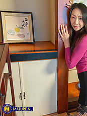 Mature asian milf naked on knees, spread pose, natural tits, shaved pussy, raw tease