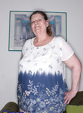 Granny Nude Solo Tease Pics Showing Bushy Pussy