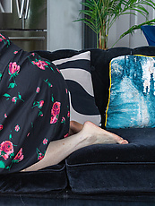 ature granny solo tease on couch with bush, sagging tits, pussy out, spread pose