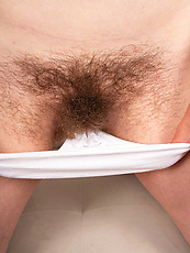 Nude babe with hairy pussy and natural tits in raw solo tease and spread pose