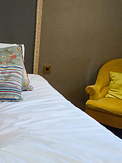 Mature naked solo tease with natural tits, bushy pussy and spread pose