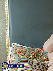 Mature naked solo tease with natural tits, bushy pussy and spread pose