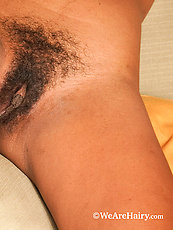 Ebony beauty naked with natural tits and bushy pussy in raw solo tease with finger