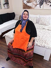 Granny and babe skirt pull panty tease, spread pose in bedroom