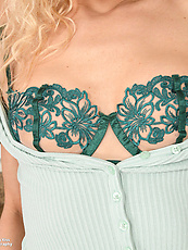 Mature nude tease on kitchen counter, natural tits, bushy pussy, spread pose