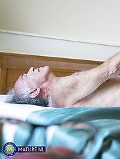 Mature gray-haired man enjoys raw blowjob from petite tits-out babe then wet cowgirl